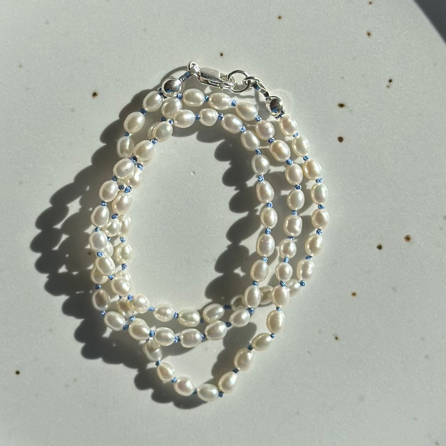 Pearls on Blue Silk 16.5"