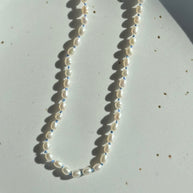 Pearls on Blue Silk 16.5