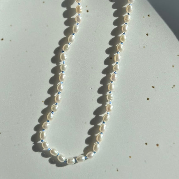 Pearls on Blue Silk 16.5"