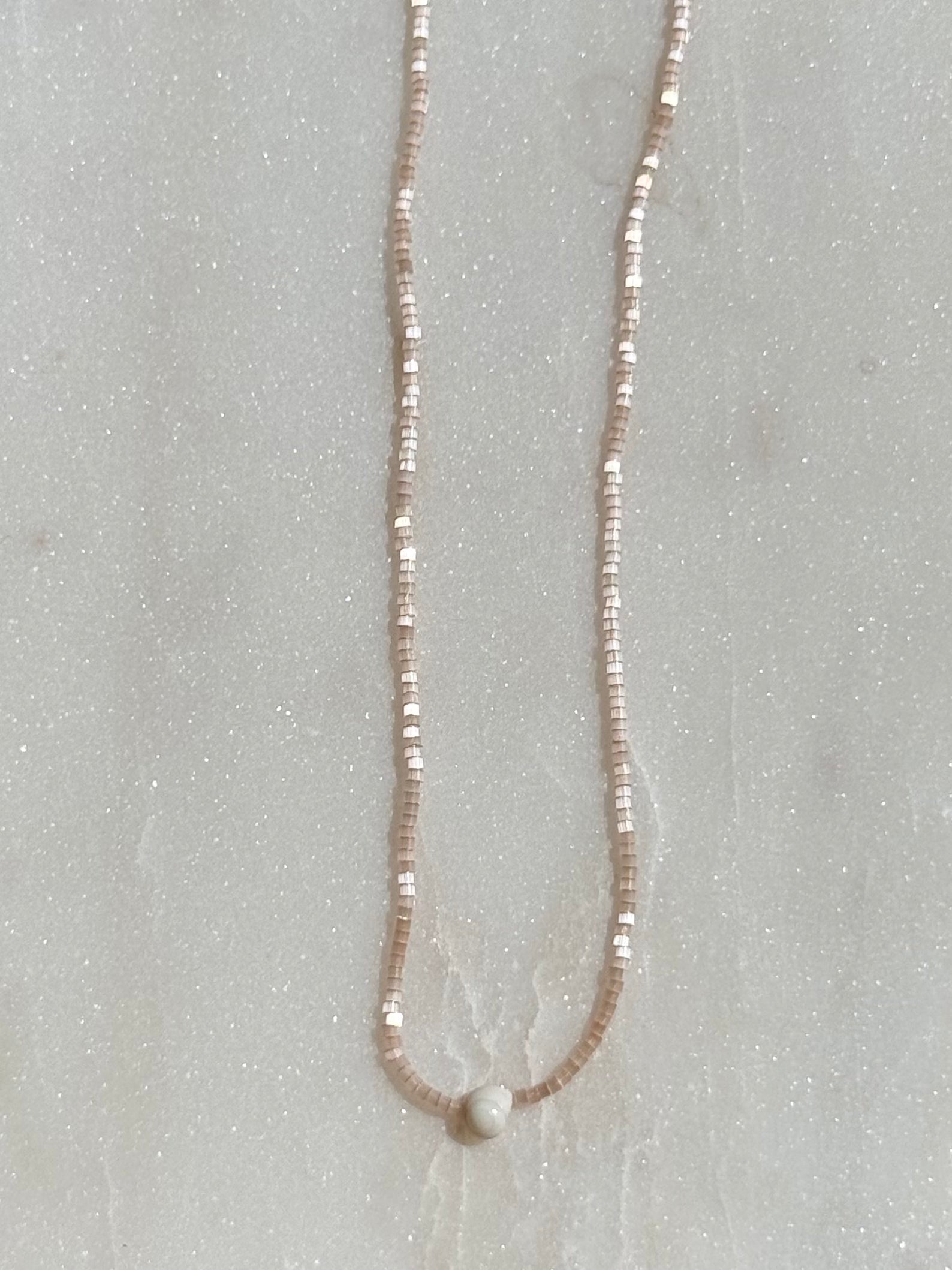 Tiny Shell on Light Pink 15.5