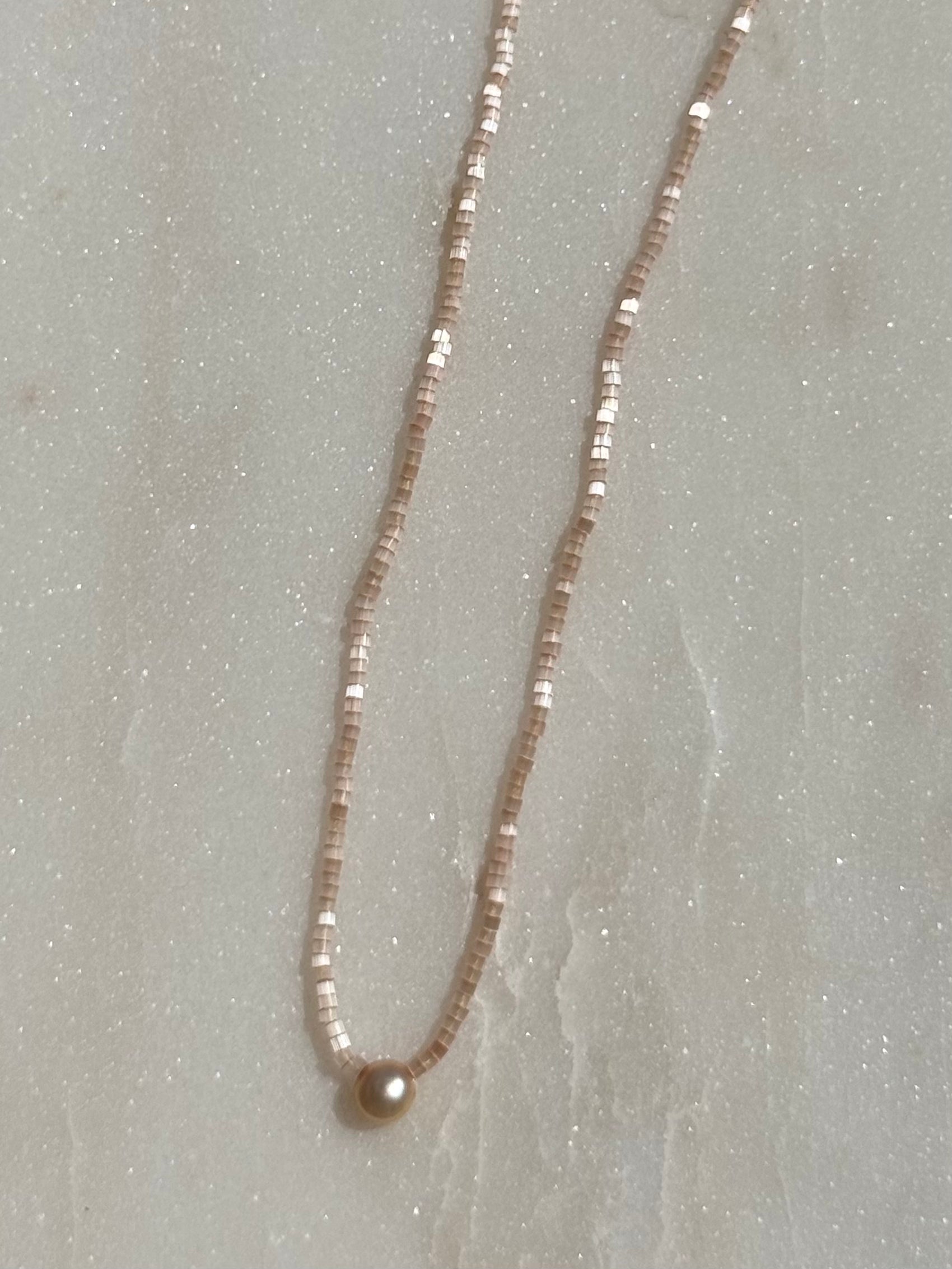 Single Pearl on Light Pink 15.25