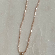 Single Pearl on Light Pink 15.25