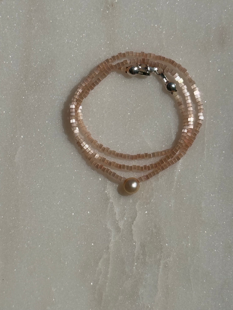 Single Pearl on Light Pink 15.25